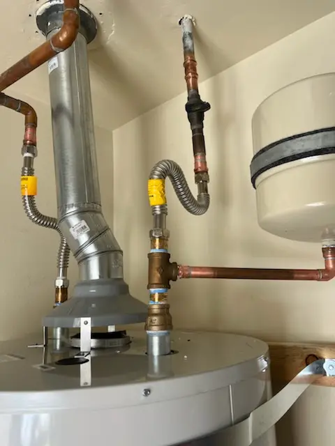 Water heater installation and plumbing repair in Tucker
